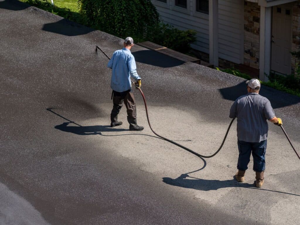 professional asphalt sealers doing driveway sealcoating